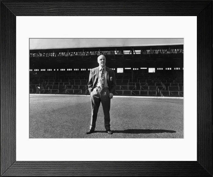 Framed Print : Liverpool manager Bil Shankly stands in front of an empty stand at Anfield