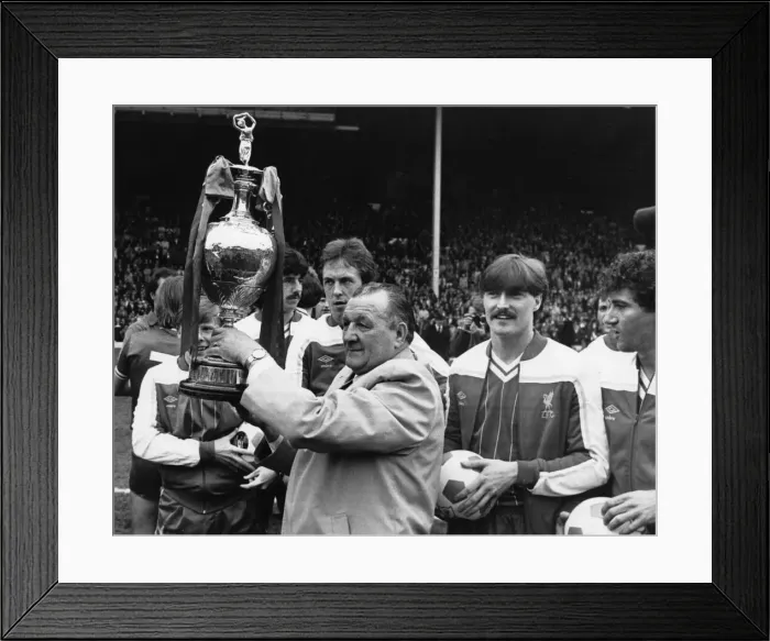 Framed Print : Liverpool manager proudly padres the League Championship trophy to the Liverpool