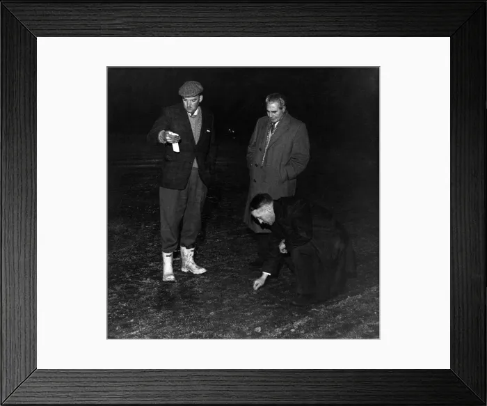 Framed Print : Liverpool manager Bill Shankly inspecting the hardness off the pitch before a match Framed Print : Liverpool manager Bill Shankly inspecting the hardness off the pitch before a match