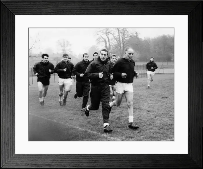 Framed Print : Liverpool players in training led by Reuben Bennett and Ian St John. Circa 1963 Framed Print : Liverpool players in training led by Reuben Bennett and Ian St John. Circa 1963