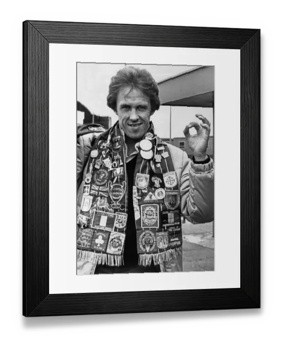 Framed Print : Liverpool footballer Phil Neal wearing a club scarf decorated with badges celebrating Framed Print : Liverpool footballer Phil Neal wearing a club scarf decorated with badges celebrating