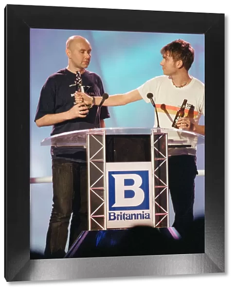 Scottish author of Trainspotting, Irvine Welsh, and Damon Albarn of Blur on stage at The