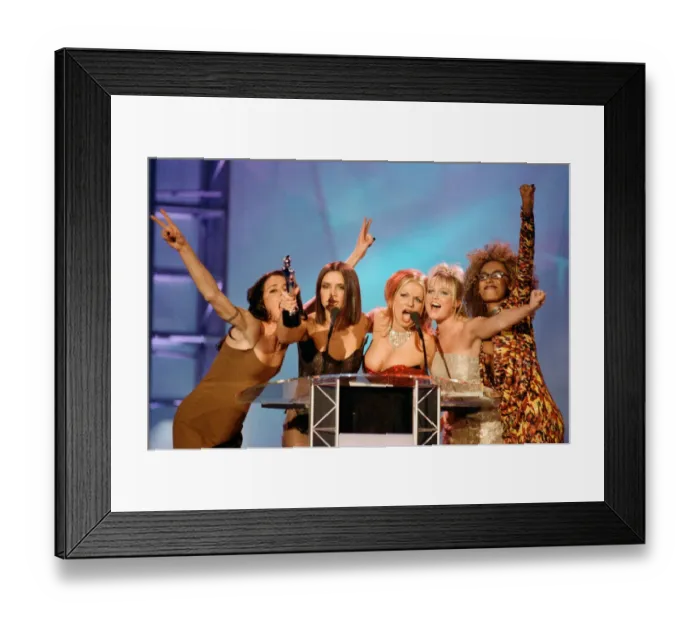 Framed Print : The Spice Girls receiving one of their awards at The Brit Music Awards at Earls Court Framed Print : The Spice Girls receiving one of their awards at The Brit Music Awards at Earls Court
