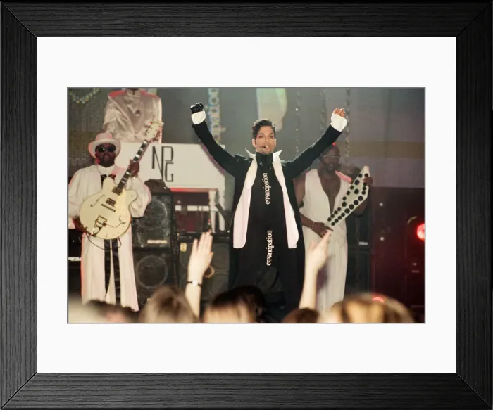 Framed Print : Prince performing at The Brit Music Awards at Earls Court. 24th February 1997 Framed Print : Prince performing at The Brit Music Awards at Earls Court. 24th February 1997