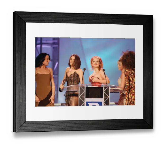 Framed Print : The Spice Girls receiving one of their awards at The Brit Music Awards at Earls Court Framed Print : The Spice Girls receiving one of their awards at The Brit Music Awards at Earls Court