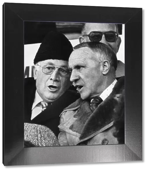 Former Liverpool manager Bill Shankly with Joe Mercer in the stands watching a match