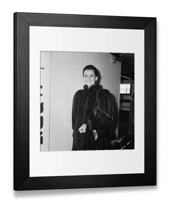Framed Print : Actress Audrey Hepburn at an airport. April 1984