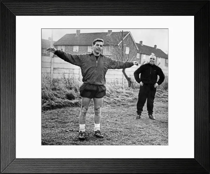 Framed Print : Liverpool manager Bill Shankly watches Gordon Milne going though his tests at Melwood Framed Print : Liverpool manager Bill Shankly watches Gordon Milne going though his tests at Melwood
