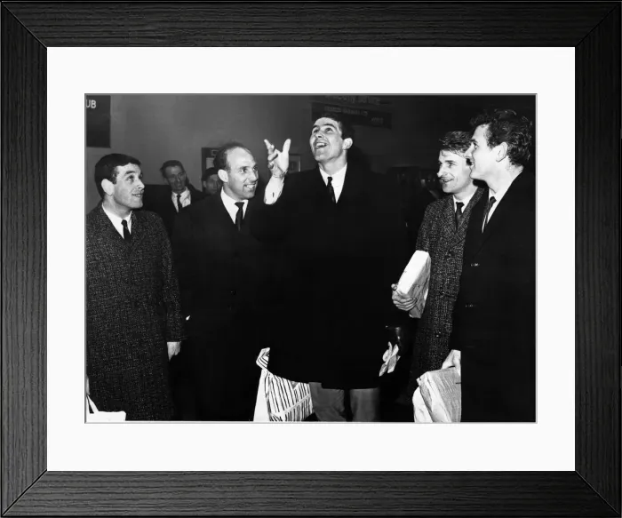 Framed Print : Liverpool captain Ron Yeats shows how the toss was made to decide the European Cup game Framed Print : Liverpool captain Ron Yeats shows how the toss was made to decide the European Cup game