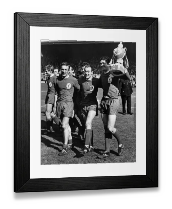 Framed Print : Liverpool players Peter Thompson, Ian St John and club captain Ron Yeats celebrate with