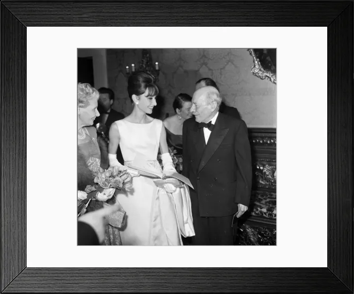 Framed Print : Actress Audrey Hepburn pictured with Earl and Countess Attlee at the London premiere of Framed Print : Actress Audrey Hepburn pictured with Earl and Countess Attlee at the London premiere of