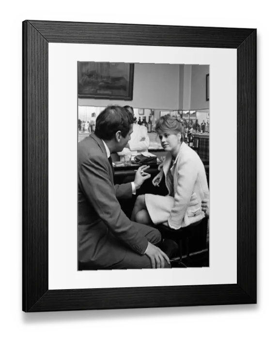 Framed Print : Jane Fonda and her husband, film director Roger Vadim, enjoy drinks at a bar in Paris Framed Print : Jane Fonda and her husband, film director Roger Vadim, enjoy drinks at a bar in Paris