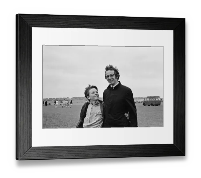 Framed Print : Ken Loach, (film director) on the school football playing field