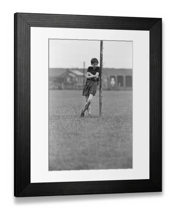 Framed Print : David Bradley, (aged 14) playing the part of Billy Casper, pictured with his Kestral