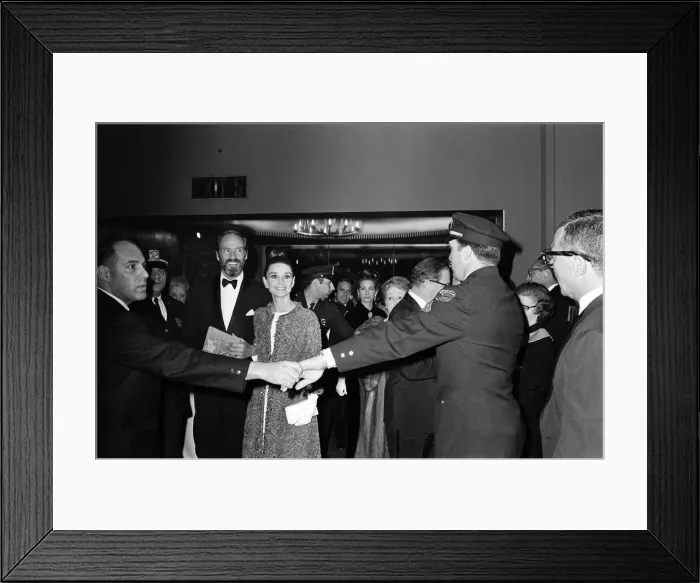 Framed Print : Actress Audrey Hepburn arrives for the premiere of My Fair Lady in New York