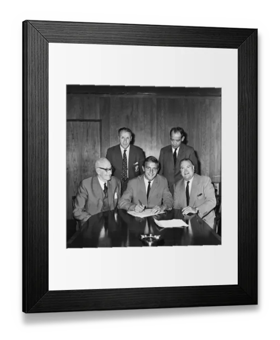 Framed Print : Footballer Peter Thompson signs for his new club Liverpool after his £37