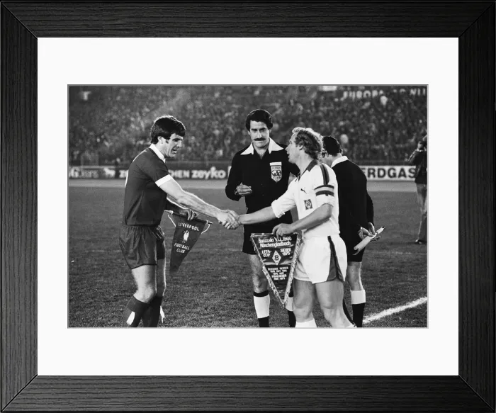 Framed Print : Borussia Munchengladbach 2 v Liverpool 1. Liverpool captain Emlyn Hughes shakes Framed Print : Borussia Munchengladbach 2 v Liverpool 1. Liverpool captain Emlyn Hughes shakes
