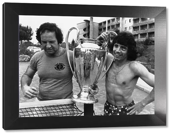 Liverpool football star Kevin Keegan poses with the European Cup trophy at the team hotel