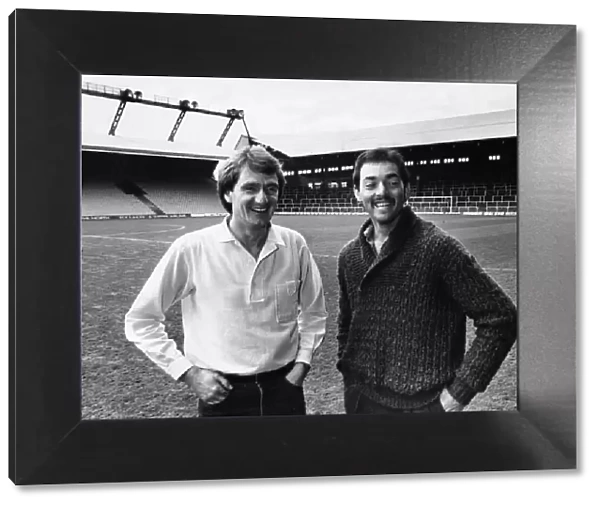 New Liverpool goalkeeper Bruce Grobbelaar poses at Anfield with club captain Phil