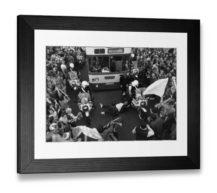 Framed Print : Football supporter lying in the road at Scotland Road as he tries to impede the bus Framed Print : Football supporter lying in the road at Scotland Road as he tries to impede the bus