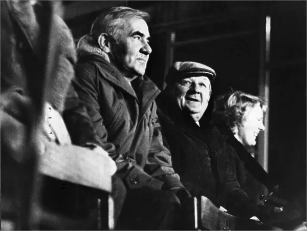 Liverpool manager Bob Paisley, in unfamiliar cap, watches Altrincham in action during
