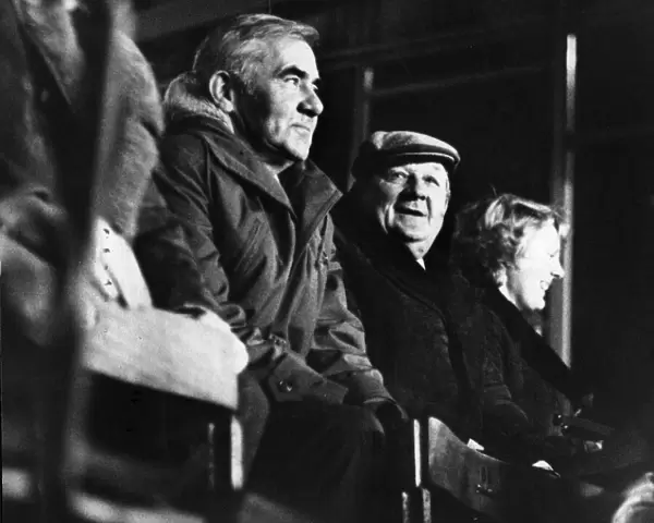 Liverpool manager Bob Paisley, in unfamiliar cap, watches Altrincham in action during