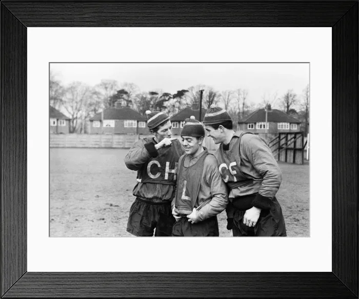 Framed Print : Liverpool footballers Willie Stevenson, Ian St John and Ron Yeats all wearing their Framed Print : Liverpool footballers Willie Stevenson, Ian St John and Ron Yeats all wearing their