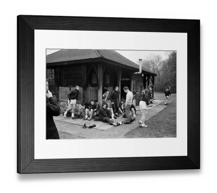 Framed Print : Injured Liverpool footballer Gordon Milne talking to his teammates as they take part in Framed Print : Injured Liverpool footballer Gordon Milne talking to his teammates as they take part in