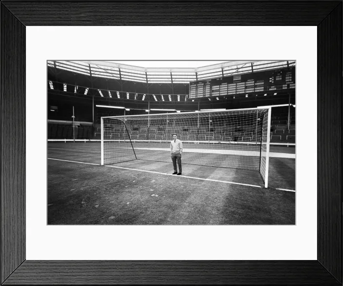 Framed Print : Injured Liverpool footballer Gordon Milne looks out over Wembley Stadium as his teammates Framed Print : Injured Liverpool footballer Gordon Milne looks out over Wembley Stadium as his teammates