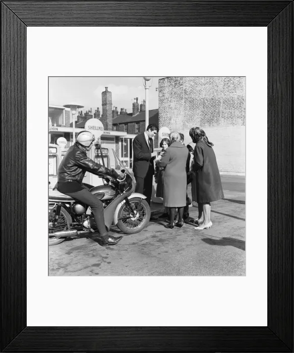 Framed Print : Liverpool centre half and captain Ron Yeats takes over a garage in High Street, Wavertree