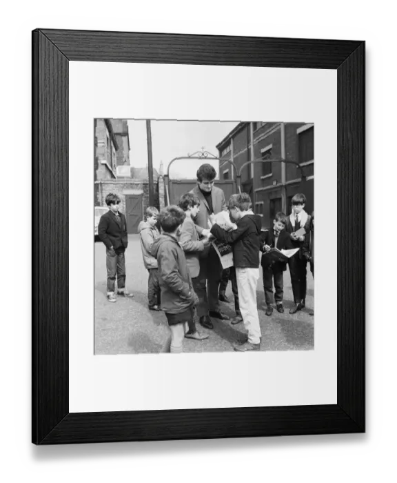 Framed Print : Liverpool goalkeeper Tommy Lawrence sign autographs for fans outside Anfield football Framed Print : Liverpool goalkeeper Tommy Lawrence sign autographs for fans outside Anfield football