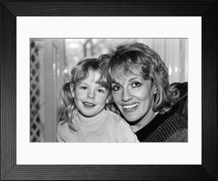 Framed Print : Esther Rantzen pictured at her home in Kew with her daughter Rebecca. 25th March 1985 Framed Print : Esther Rantzen pictured at her home in Kew with her daughter Rebecca. 25th March 1985