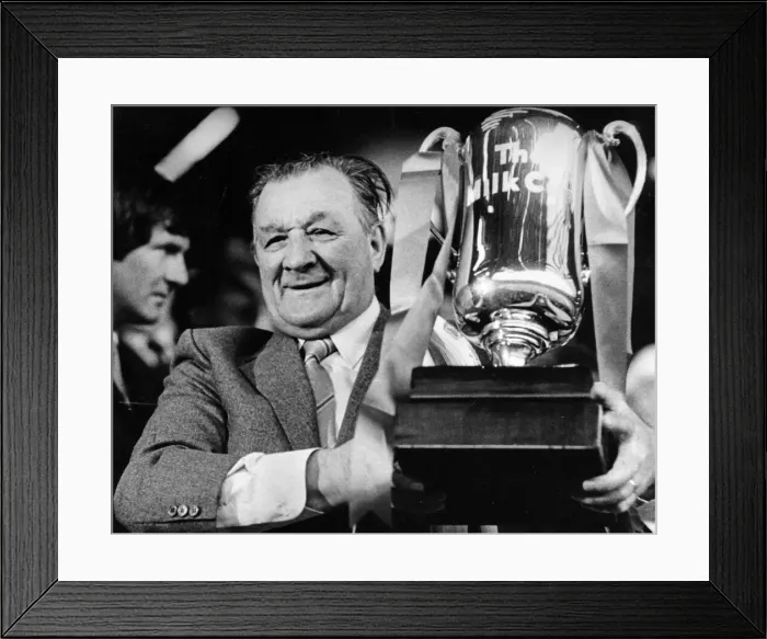 Framed Print : Liverpool manager Bob Paisley with the Milk Cup trophy following his side Framed Print : Liverpool manager Bob Paisley with the Milk Cup trophy following his side