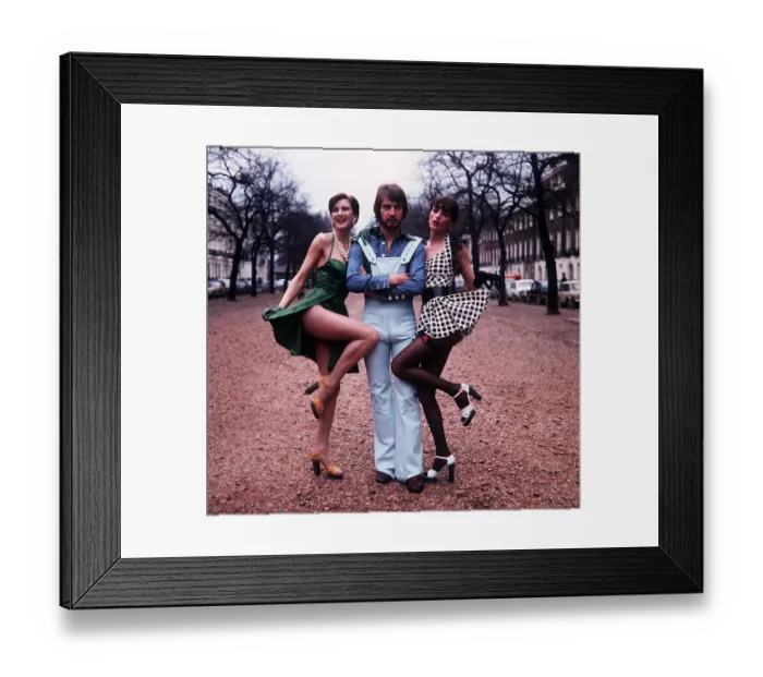 Framed Print : Alan Hudson Football player for Chelsea poses with models Renate & Cindy msi