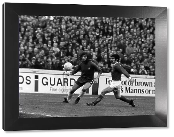 Tony Dunne Manchester United beats Alan Hudson Jan 1971 to the ball during match