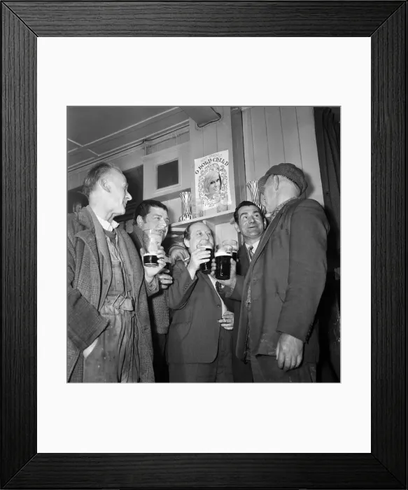 Framed Print : Enjoying a drink in the Subway club, meeting place for fisherman and dockers. March 1965