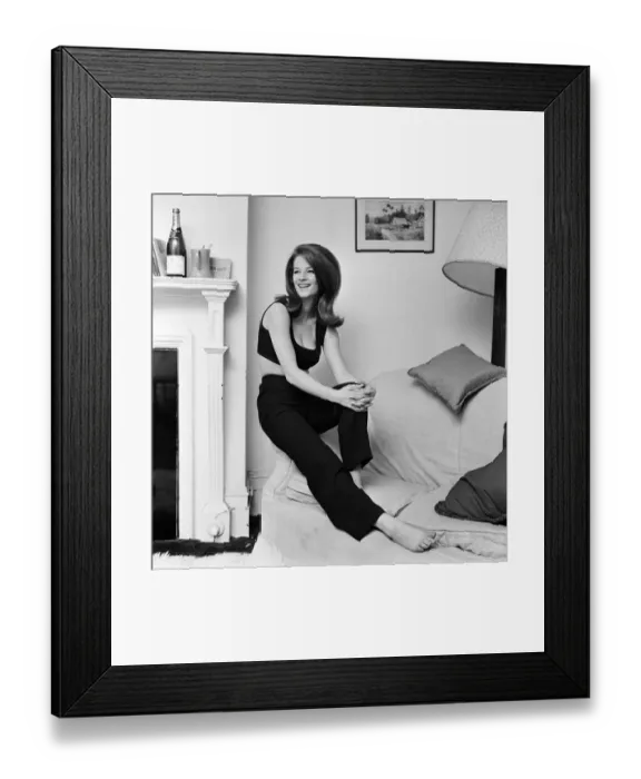 Framed Print : 19-year-old actress Charlotte Rampling pictured in her Chelsea flat. 6th December 1965 Framed Print : 19-year-old actress Charlotte Rampling pictured in her Chelsea flat. 6th December 1965