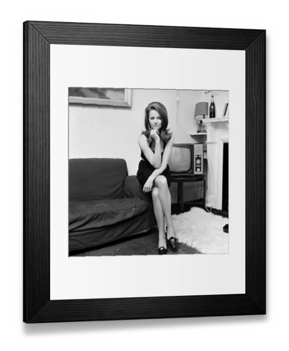Framed Print : 19-year-old actress Charlotte Rampling pictured in her Chelsea flat. 6th December 1965 Framed Print : 19-year-old actress Charlotte Rampling pictured in her Chelsea flat. 6th December 1965