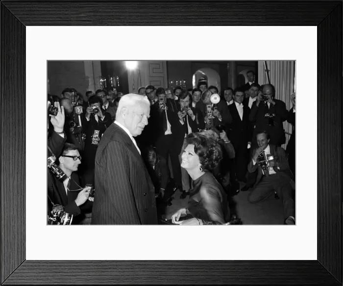 Framed Print : Sophia Loren and Charlie Chaplin at a press conference at the Savoy Hotel, London