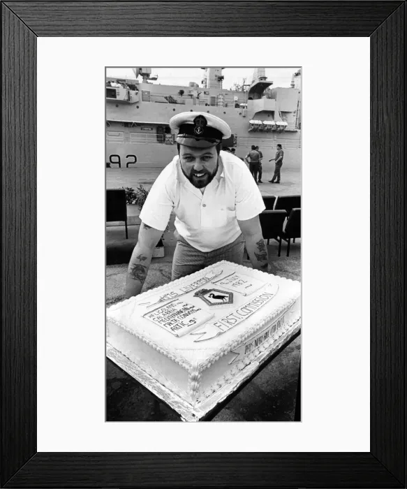 Framed Print : Chef, Petty Officer Bill Colmer with the cake made to commemorate HMS Liverpool
