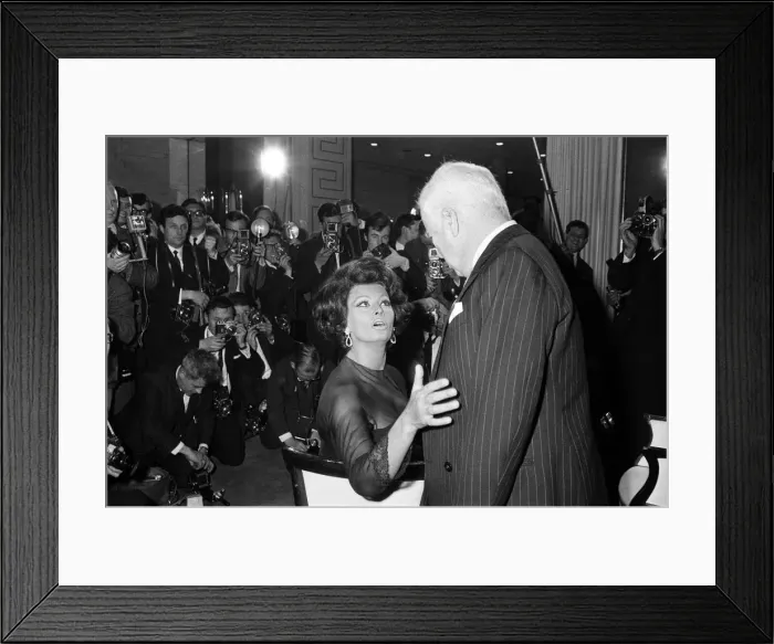 Framed Print : Sophia Loren and Charlie Chaplin at a press conference at the Savoy Hotel, London Framed Print : Sophia Loren and Charlie Chaplin at a press conference at the Savoy Hotel, London