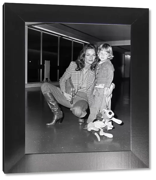 Charlotte Rampling at Heathrow Airport with her son Barnaby. 6th March 1976