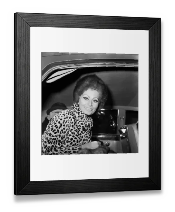 Framed Print : Sophia Loren and her husband Carlo Ponti arriving at London Airport. 15th January 1966
