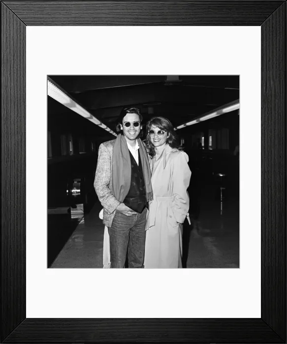 Framed Print : Charlotte Rampling and her husband Jean-Michel Jarre arriving at Heathrow Airport Framed Print : Charlotte Rampling and her husband Jean-Michel Jarre arriving at Heathrow Airport