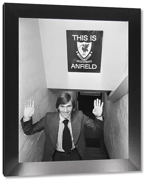 New Liverpool signing Kenny Dalglish poses by the famous sign in the tunnel at Anfield