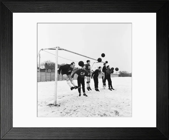 Framed Print : Liverpool FC footballers training in the snow ahead of their FA cup match against Wrexham
