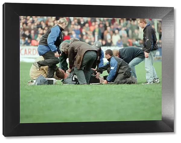 Gwyn Jones (number 7 ) lies on the ground during the Cardiff verses Swansea Rugby Match