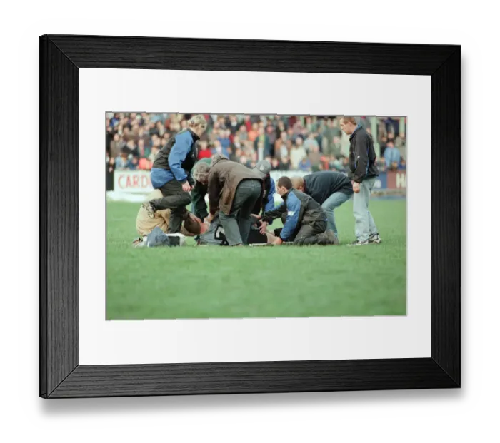 Framed Print : Gwyn Jones (number 7 ) lies on the ground during the Cardiff verses Swansea Rugby Match