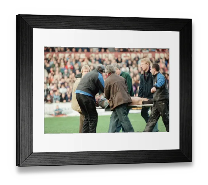 Framed Print : Gwyn Jones (number 7 ) is stretchered off the ground during the Cardiff verses Swansea Framed Print : Gwyn Jones (number 7 ) is stretchered off the ground during the Cardiff verses Swansea