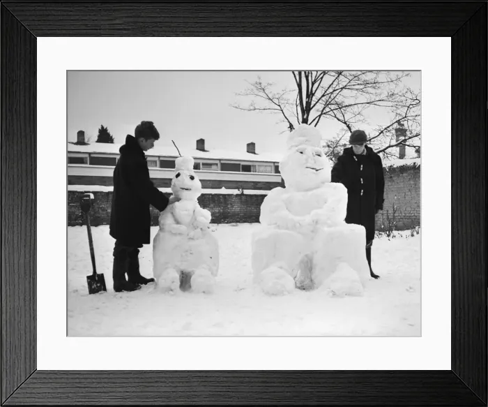 Framed Print : Two young boys from Dry Drayton, Cambridgeshire, take the opportunity of the heavy snow Framed Print : Two young boys from Dry Drayton, Cambridgeshire, take the opportunity of the heavy snow